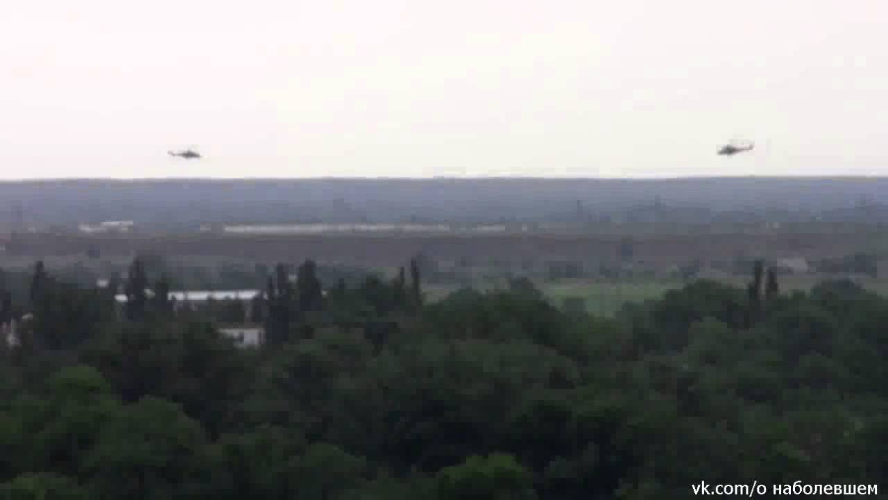 Separātisti mēģina notriekt Ukrainas armijas helikopteru. (Separatists are trying to kncok down Ukrainian army helicopter)