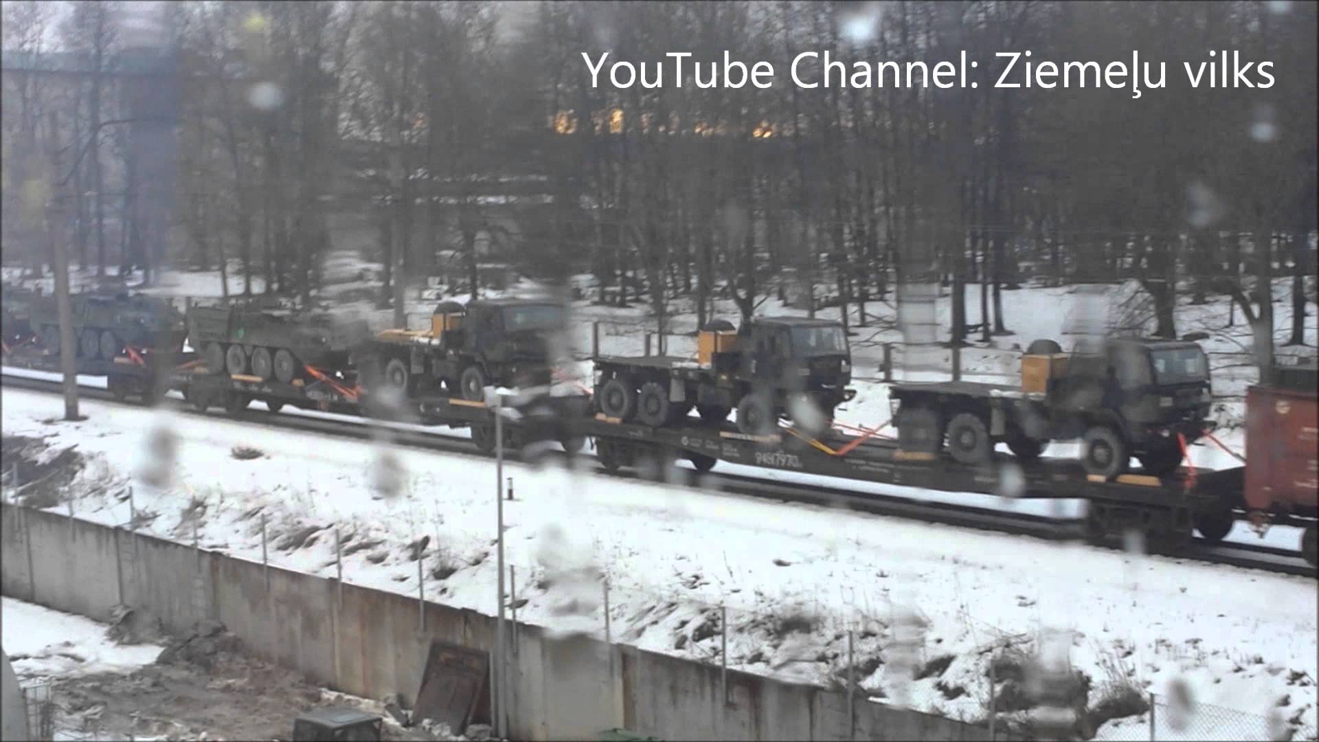 VIDEO: Aculiecinieka video: Latvijā ieved iespaidīgu armijas tehniku! (Army equipment relocation in Riga)