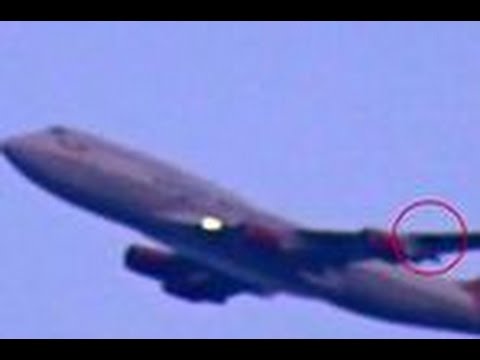 VIDEO: Aculiecinieks nofilmē NLO, kurš bīstami pietuvojas pasažieru lidmašīnai! (Footage Of UFO Passing Virgin Atlantic Plane!)