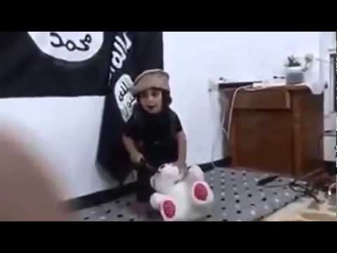 VIDEO: Smadzeņu skalošana Islāma valsts gaumē! (What? ISIS Video shows Young Boy Practicing Beheading on his Teddy Bear Stuffed Animal)