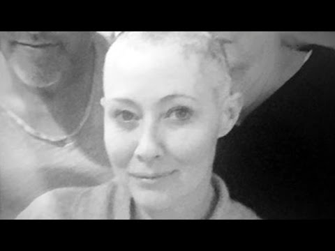 VIDEO: Aktrises Šenonas Dohertijas cīņa ar vēzi nav beigusies.. Tas turpina izplatīties..